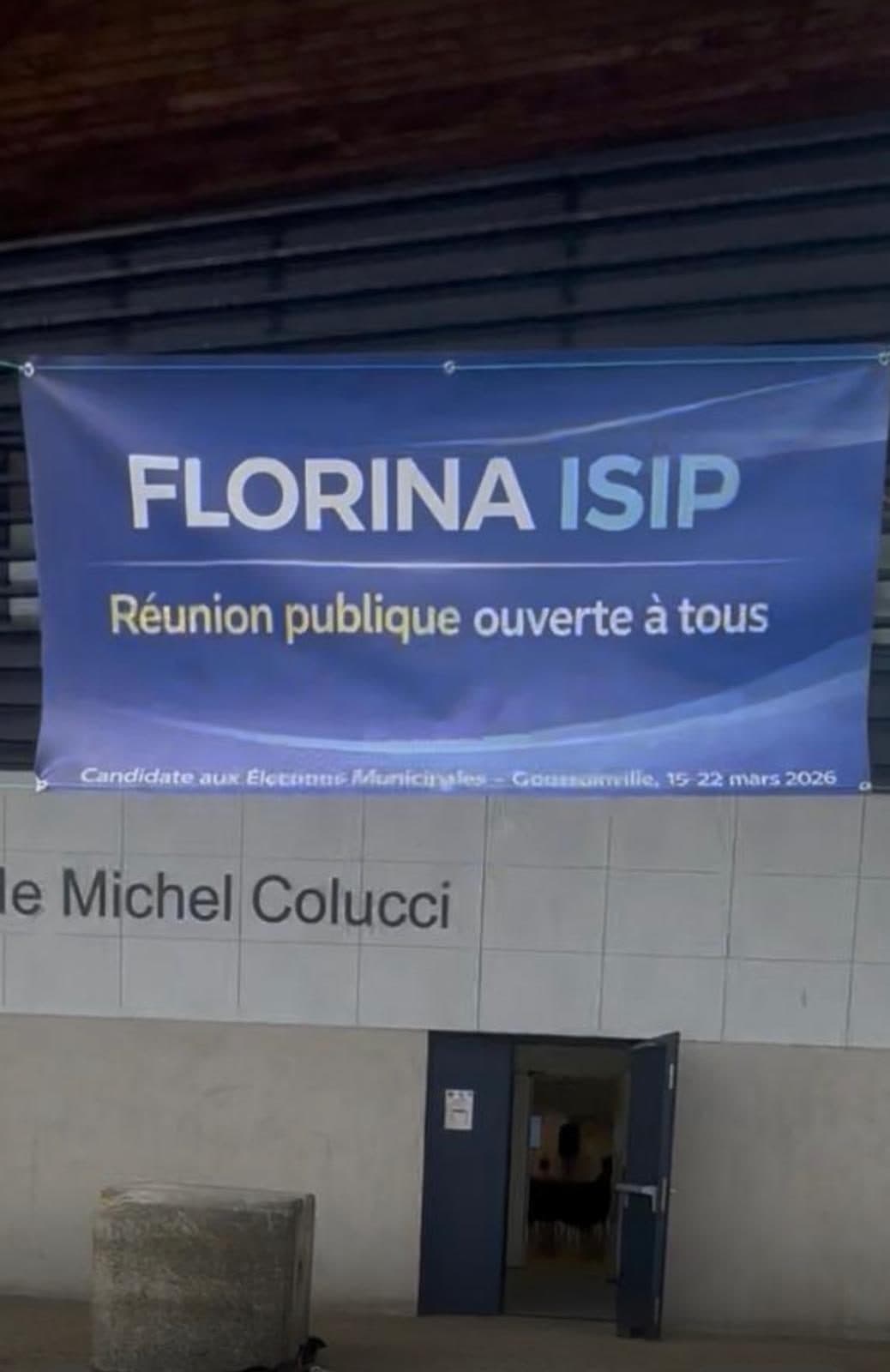 Banderole de la réunion publique de Florina Isip à la salle Michel Colucci, Goussainville